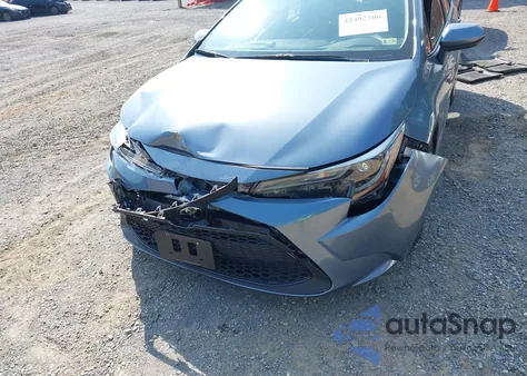 2022 Toyota Corolla Le z USA, uszkodzony, nr VIN JTDEPMAE2NJ221443
